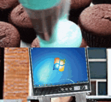 a computer monitor with a windows logo on it