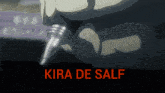 a close up of a person holding a pen with the words kira de salf written below it