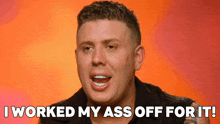 a man with a tattoo on his arm says i worked my ass off for it