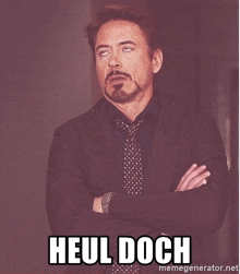 a man in a suit and tie says heul doch