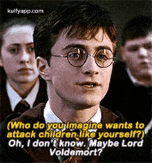 harry potter is talking to a group of children while wearing glasses and a tie .