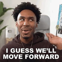 a man with curly hair is smiling and says i guess we 'll move forward .