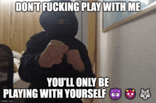 a person in a black hoodie with a caption that says " do n't fucking play with me