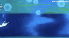 a person 's hand is pointing at a blue object in the water .