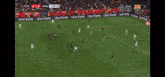 a soccer game is being played with uber eats advertisements on the sidelines