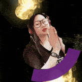 a woman wearing glasses and headphones is surrounded by a purple border