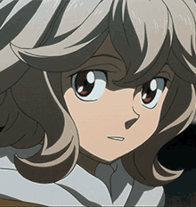 a close up of a anime character 's face with a serious look on her face
