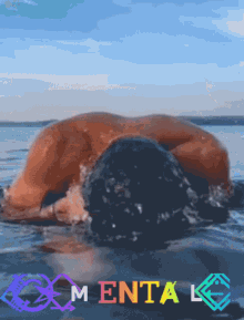 a picture of a man in the water with the words mental written on the bottom