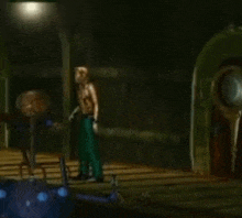 a man in a cowboy hat is standing in a dark room next to a robot .