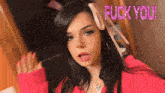 a girl with a pink bow on her head and the words fuck you on the bottom