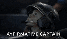 a woman wearing a helmet with the words ayfirmative captain written above her