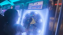 a person playing a video game with a score of 123