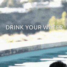 a swimming pool with the words drink your water on the bottom