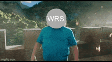 a man in a blue shirt has a circle with wrs on it