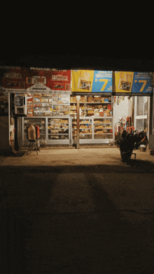 a store front with a sign that says ' 7 ' on it