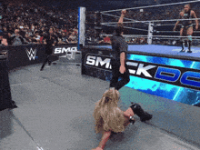 a wrestling ring with a sign that says smack doe