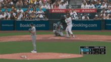 a baseball game is being played in front of a crowd that is sponsored by state farm and razr