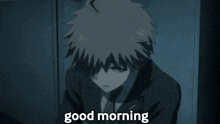a boy in a suit and tie says " good morning "