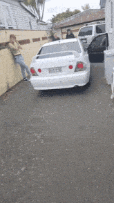 a white car with the license plate du5736