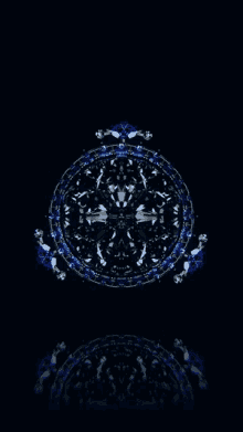 a black background with a blue and white circular design on it