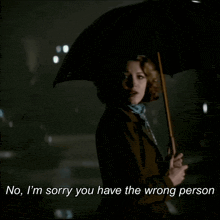 a woman holding an umbrella with the words " no i 'm sorry you have the wrong person "