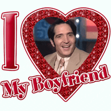 a heart with a picture of a man and the words " i love my boyfriend " on it