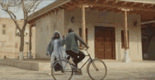 волшебныйтрюк велосипеднамотоцикл GIF - волшебныйтрюк велосипеднамотоцикл джин GIFs