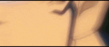 a close up of a person 's shadow on a wall .