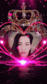 a picture of a woman in a heart shaped frame with a crown
