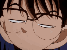 a close up of a cartoon character 's face with glasses on