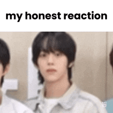 a close up of a person 's face with the words `` my honest reaction '' below it .