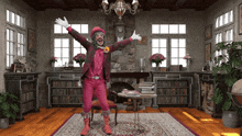 a clown in a pink outfit is standing in a living room with his arms outstretched