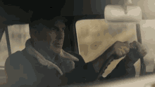 Driving Kevin Costner GIF