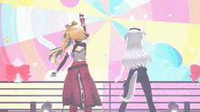 two anime characters are dancing on a stage with a banner that says ' i love you '