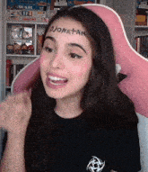 a girl with the name jonatan on her forehead
