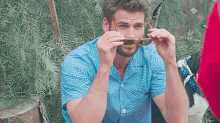 Liam Hemsworth Gq Australia GIF - Liam Hemsworth Gq Australia Sunglasses GIFs