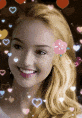 a woman with blonde hair and hearts around her