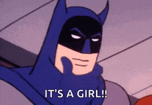 a cartoon of batman holding his hand to his face and saying it 's a girl .