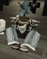a video game character named iri is sitting on a wooden floor