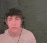 a blurry photo of a man wearing headphones
