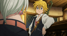 a man with a sword is standing next to another person