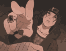 a cartoon character is holding a ring in his hand and pointing at the camera .