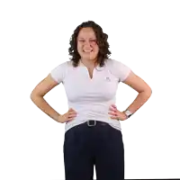a woman wearing a white shirt with the letter m on the front