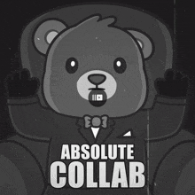 a black and white teddy bear with the words absolute collab