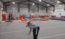 one foot stand spinning tumbling gymnastics aerobatics