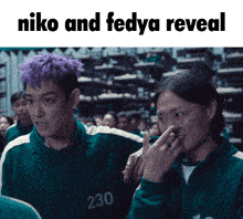 a man with purple hair is standing next to another man with the number 230 on his jacket