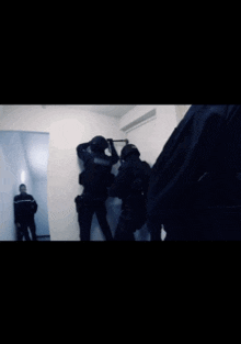 a group of police officers are in a room