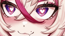 a close up of a girl 's eyes with a heart in them