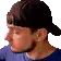 a man with a beard is wearing a baseball cap and a blue shirt .