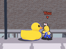 a cartoon character standing next to a rubber duck that says true on it